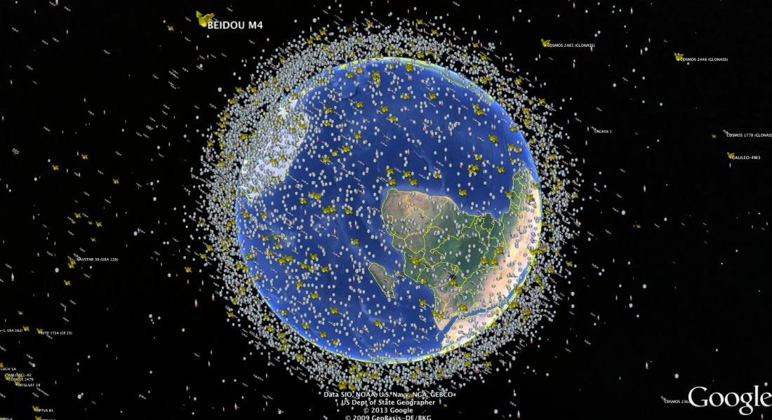 planet Earth surrounded by satellite debris